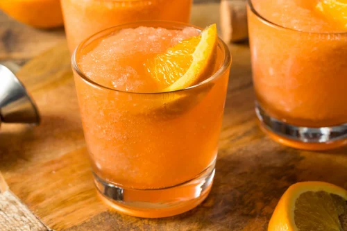 Homemade Frozen Aperol Spritz Slushy with an Orange
